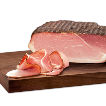 Bauernbraten auf Holzplatte Handl Tyrol